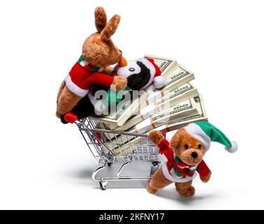 Les aides du Père Noël avec un panier plein d'argent. Concept de Noël amusant Banque D'Images