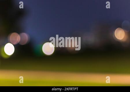 Photo d'un arrière-plan coloré avec des lumières floues. Banque D'Images