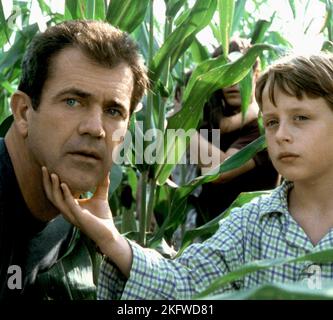 MEL GIBSON, RORY CULKIN, signes, 2002 Banque D'Images