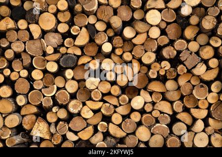 Pile de bois de chauffage en arrière-plan Banque D'Images