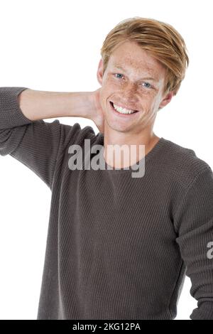 Sensation d'assurance et look décontracté. Studio portrait d'un beau jeune homme aux cheveux de gingembre. Banque D'Images