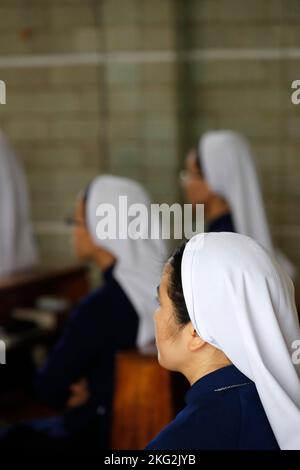 Église catholique. Communauté dominicaine. Le catholicc nuns à la masse. Bien Hoa. Vietnam. Banque D'Images