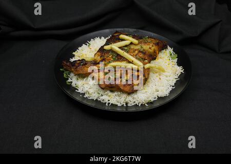 Poulet au charbon de bois et riz au ghee Banque D'Images