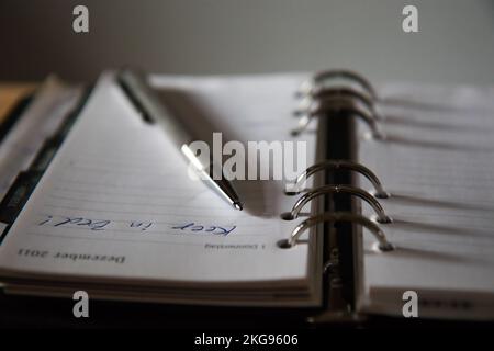 note manuscrite sur le livre blanc Banque D'Images