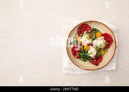 Portion de tomates grillées et de stracciatella Banque D'Images