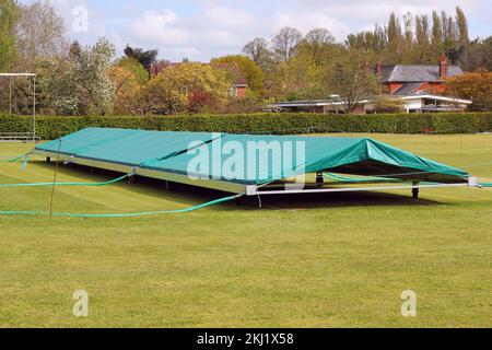 Caches de terrain de cricket pour une protection contre les intempéries. Banque D'Images