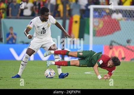 Qatar. 24th novembre 2022. AMARTEY Daniel (GHA), action, duels contre JOAO FELIX (por). Portugal (por) - Ghana (GHA) 3-2 Groupe Stage Groupe H sur 24.11.2022, Stade 974 coupe du monde de football 2022 au Qatar à partir de 20,11. - 18.12.2022 ? Credit: dpa Picture Alliance/Alay Live News Banque D'Images