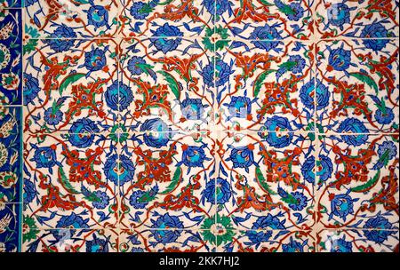 Seamless pattern white Turkish tiles with blue ornaments. Old surface texture, wall in mosque Stock Photo