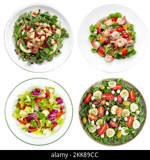 Assiette à salade de légumes frais et de légumes verts isolée sur fond blanc. Vue de dessus coupe de nourriture saine Banque D'Images