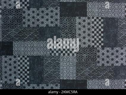 Arrière-plan de texture très détaillé d'un patchwork japonais imprimé sur un tissu avec des formes géométriques traditionnelles représentant divers motifs lik Banque D'Images