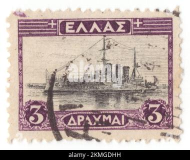 GRÈCE - 1927 1 avril: Un timbre-poste noir et violet profond de 3 drachma représentant le Cruiser “Georgios Averoff”, est un croiseur blindé de classe Pise modifié construit en Italie pour la Marine royale hellénique dans la première décennie du 20th siècle. Le navire a servi de navire amiral grec pendant la majeure partie de la première moitié du siècle. Bien que populairement connu comme cuirassé en grec, elle est en fait un croiseur blindé, le seul navire de ce type encore en existence. Le navire a été initialement commandé par la marina italienne de Regia, mais des contraintes budgétaires ont conduit l'Italie à l'offrir à la vente à des clients internationaux Banque D'Images