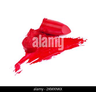 Ajoutez un peu de couleur à votre beauté. Morceaux de rouge à lèvres brillant tachés sur un fond blanc. Banque D'Images