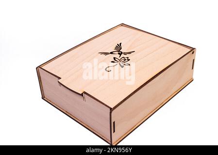 Vitamines et produits biologiques dans le cadeau. Miel dans un pot avec un bâton et des bougies de cire. Cadeau dans une boîte isolée sur blanc Banque D'Images