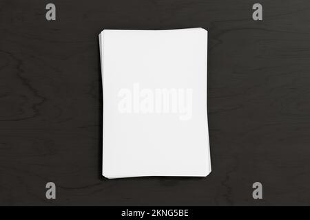 Pile de maquette de papier sur le fond noir Banque D'Images