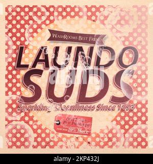 Affiche ancienne de boîte à linge sur une promotion de faux produit de savon à l'ancienne. Publicité Laundo SOAP Suds Banque D'Images
