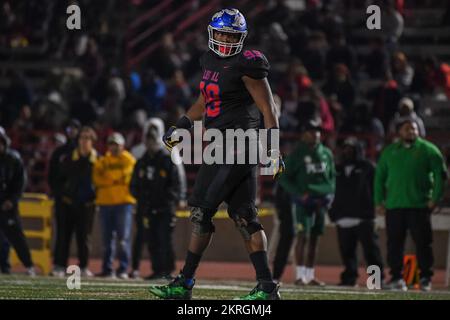 Los Alamitos Griffins défensive End T.A. Cunningham (99) lors d'un match final de 1 quarts de la CIF Southern Section Division contre long Beach Poly vendredi Banque D'Images