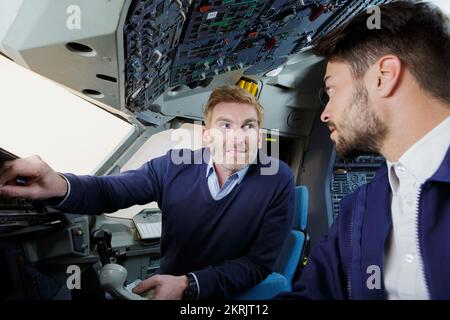 pilote et apprenti dans le poste de pilotage Banque D'Images