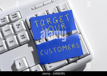 Texte d'écriture Target vos clients, Business concept visent les clients qui sont le plus susceptibles d'acheter de vous Banque D'Images