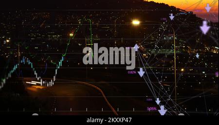 Les courbes financières sur la ville la nuit. Banque D'Images