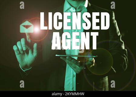 Agent sous licence de texte d'écriture manuscrite. Concept signification Vendeur autorisé et accrédité de polices d'assurance Banque D'Images