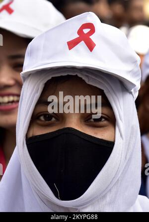 Guwahati, Assam, Inde. 1st décembre 2022. Les infirmières participent à un rassemblement de sensibilisation au sida dans le cadre de la célébration de la Journée mondiale du sida à Guwahati, dans l'État d'Assam. (Image de crédit : © Dasarath Deka/ZUMA Press Wire) Banque D'Images