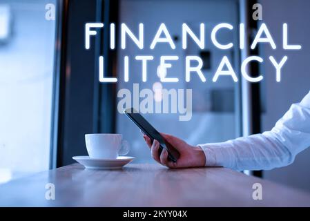 Écriture affichant le texte Financial Literacy. Mot pour comprendre et savoir comment fonctionne l'argent Banque D'Images