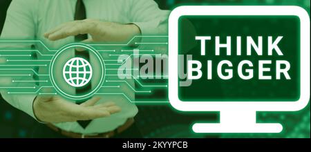 Affiche d'écriture à la main pensez plus grand. Le concept d'entreprise étant capable de rêver et de visualiser ce que vous pouvez réaliser Banque D'Images