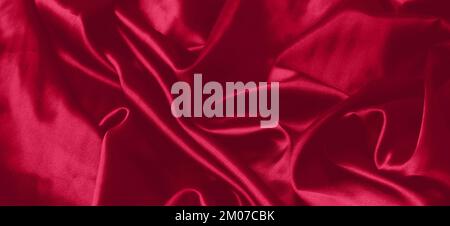 Tissu de texture monochrome couleur Viva Magenta. Arrière-plan monochrome. Couleur tendance 2023. Banque D'Images