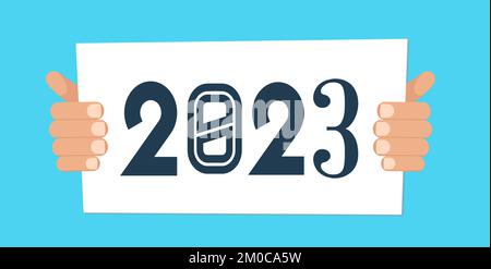 Mains tenant la bannière du nouvel an avec 2023 Illustration de Vecteur