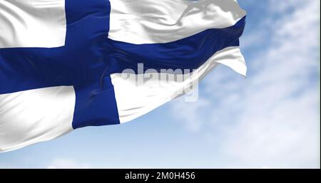 Drapeau national finlandais agitant dans le vent par temps clair. La République de Finlande est un pays nordique d'Europe du Nord. Mise au point sélective. 3d illustrat Banque D'Images