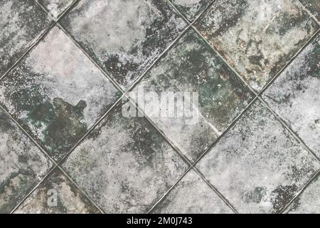 Carreaux de céramique gris intérieur moderne avec motif abstrait effet sale mosaïque texture murale arrière-plan. Banque D'Images