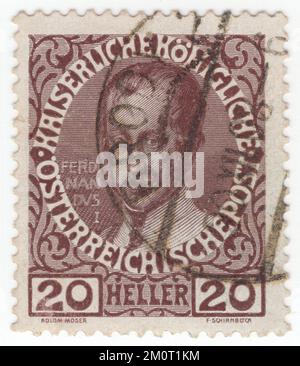 AUTRICHE - 1913: Un timbre-poste au chocolat heller de 20 représentant un portrait de Ferdinand I. Série définitive émise pour les 60th années du règne du monarque autrichien Franz Josef, empereur d'Autriche, roi de Hongrie, et des autres États de la monarchie des Habsbourg. Ferdinand I fut l'empereur d'Autriche de mars 1835 jusqu'à son abdication en décembre 1848. Il était également roi de Hongrie, de Croatie et de Bohême (sous le nom de Ferdinand V), roi de Lombardie–Venetia et titulaire de nombreux autres titres de moindre importance. En raison de son caractère passif mais bien intentionné, il a gagné le sobriquet le bienveillant ou le bienveillant Banque D'Images