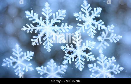 Arrière-plan flou des flocons de neige - illustration numérique. Banque D'Images