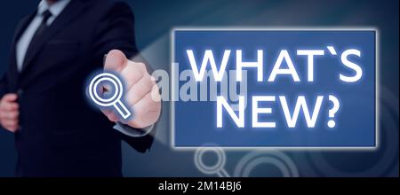 Affiche textuelle indiquant les nouveautés. Approche de l'entreprise poser des questions sur les dernières mises à jour tendances nouvelles Banque D'Images