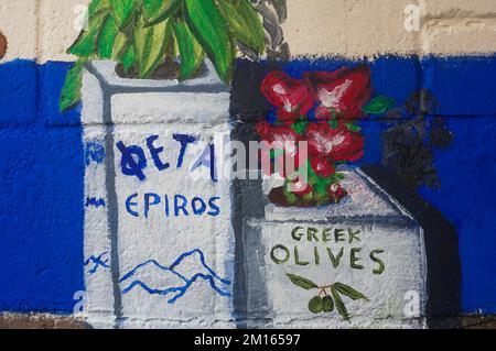 Mur peint dans la salle à manger du restaurant grec olive à Swindon Wiltshire Angleterre Banque D'Images