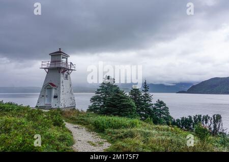 Woody point, Terre-Neuve, Canada : phare de Woody point, sur la baie bonne, dans le parc national du gros-Morne, désigné phare patrimonial par le Canad Banque D'Images