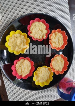 un petit cupcakes sous forme de pâtisserie sur la table Banque D'Images