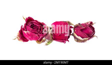 Tas de roses de thé sec bourgeons isolés sur fond blanc. Thé de fleur de rose. Thé de la rose de Phnom Penh. Masque Banque D'Images