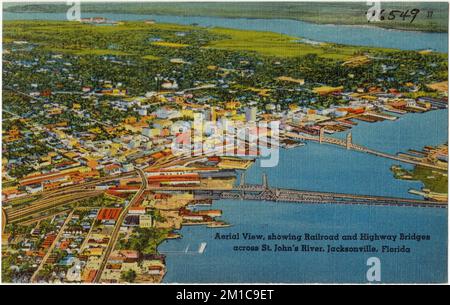 Vue aérienne, montrant les ponts de chemin de fer et d'autoroute de l'autre côté de la rue John's River, Jacksonville, Floride , Rivers, Tichnor Brothers Collection, Cartes postales des États-Unis Banque D'Images