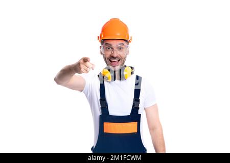 homme de travail surpris isolé sur fond blanc. workman en studio. homme de travail Banque D'Images