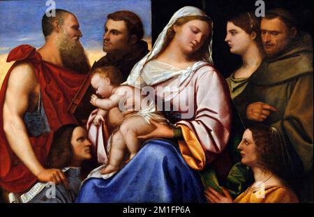 Madonna et l'enfant avec les saints et les donateurs par le peintre italien Sebastiano del Piombo (1485-1547), huile sur bois Banque D'Images