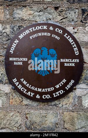 Memorial plaque à John Mortlock & Co Ltd Cambridge - Mortlock fonde Mortlock's Bank en 1780. La banque a été fusionnée avec la Baclays Bank en 1896. Banque D'Images