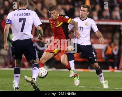 20121016 - BRUXELLES, BELGIQUE : Toby Alderweireld en Belgique et James Morrison en Écosse se battent pour le ballon lors d'un match des Red Devils, l'équipe nationale belge de football, contre l'Écosse, quatrième match de qualification pour les Championnats du monde de football 2014, le mardi 16 octobre 2012 au Stade Roi Baudouin (Stade Roi Baudouin/Koning Boudewijnstadion), à Bruxelles. Au début du match, la Belgique dirige le groupe A. BELGA PHOTO VIRGINIE LEFOUR Banque D'Images