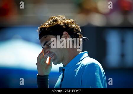 20130115 - MELBOURNE, AUSTRALIE : Roger Federer de Suisse en action pendant le match entre Roger Federer de Suisse et français Benoit paire (FRA), lors du premier tour du tournoi masculin au Grand Chelem 'Open d'Australie', mardi 15 janvier 2013 au Melbourne Park, Melbourne, Australie. Federer remporte les prix 6-2, 6-4, 6-1. BELGA PHOTO PATRICK HAMILTON Banque D'Images