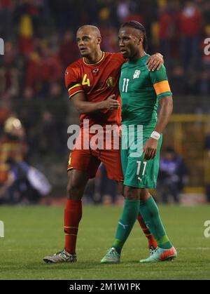 Vincent Kompany en Belgique et Didier Drogba en Côte d'Ivoire, photographiés après un match de football amical entre l'équipe nationale belge les Red Devils et la Côte d'Ivoire, le mercredi 05 mars 2014 à Bruxelles. Banque D'Images