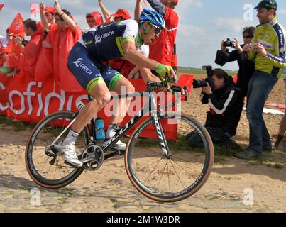 L'australien Mathew Hayman d'Orica GreenEdge photographié en action lors de la cent douze édition de la course cycliste classique d'une journée « Paris-Roubaix », à 257 km de Paris à Roubaix, France, dimanche 13 avril 2014. Banque D'Images