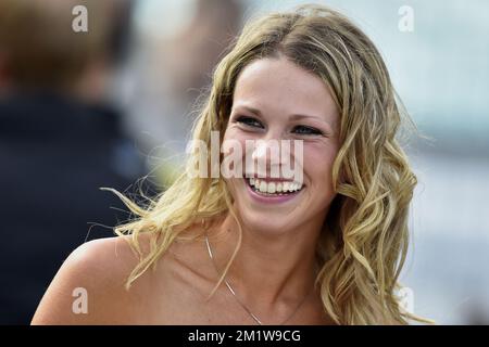 Marion Rousse, petite amie française de Tony Gallopin, photographiée à l'étape 9 de l'édition 101st de la course cycliste Tour de France, à 170 km de Gerardmer à Mulhouse, le dimanche 13 juillet 2014, en France. Banque D'Images