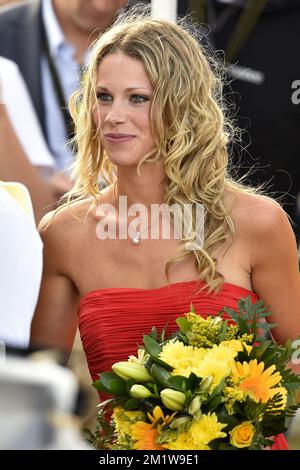 Marion Rousse, petite amie française de Tony Gallopin, photographiée à l'étape 9 de l'édition 101st de la course cycliste Tour de France, à 170 km de Gerardmer à Mulhouse, le dimanche 13 juillet 2014, en France. Banque D'Images