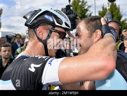 Allemand Tony Martin de l'équipe Omega Pharma - Quick Step célèbre après avoir remporté la phase 9 de l'édition 101st de la course cycliste Tour de France, à 170 km de Gerardmer à Mulhouse, le dimanche 13 juillet 2014, en France. Banque D'Images