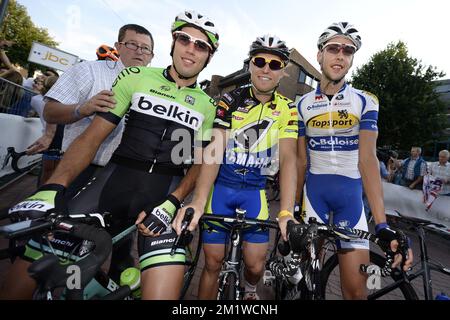 Belgian Maarten Wynants of Belkin Pro Cycling Team, Belge Jeremy Van Horebeek et Belge Sander Helven de l'équipe Topsport Vlaanderen - Baloise photographié avant l'édition 9th de la course cycliste 'Procronde van Lommel', mercredi 30 juillet 2014 à Lommel. Le concours fait partie des 'critérios' traditionnels, courses locales dans lesquelles se disputent principalement les cyclistes qui ont roulé sur le Tour de France. Banque D'Images